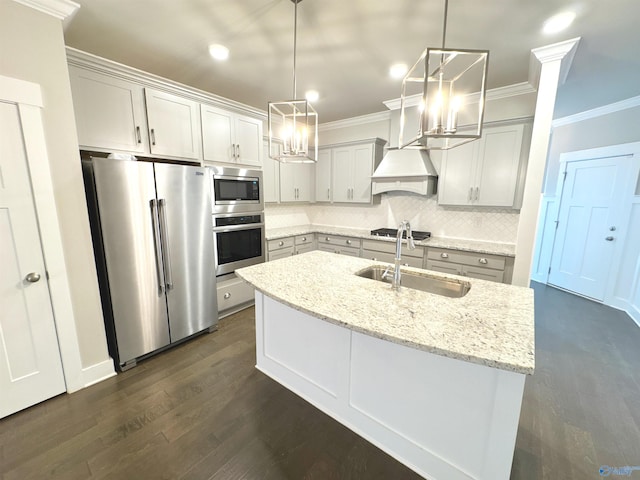 kitchen featuring dark wood finished floors, backsplash, appliances with stainless steel finishes, ornamental molding, and a sink