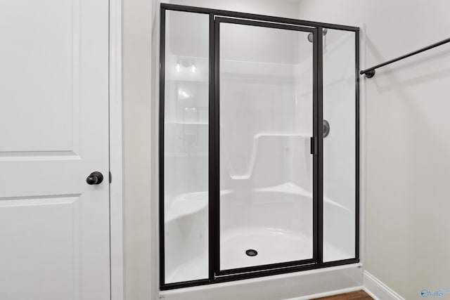 bathroom featuring a stall shower