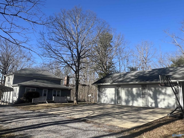 view of home's exterior featuring a carport and a porch