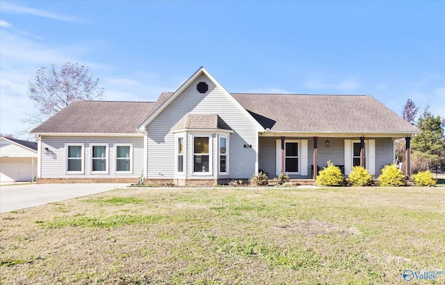 ranch-style house with a porch and a front lawn