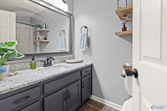 bathroom featuring tile patterned floors and vanity