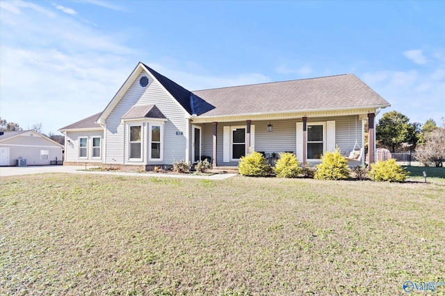 ranch-style home with a porch and a front yard