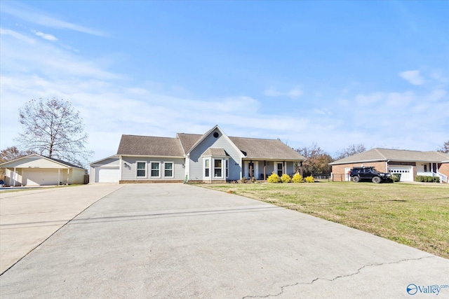 view of front facade with a front yard and a garage