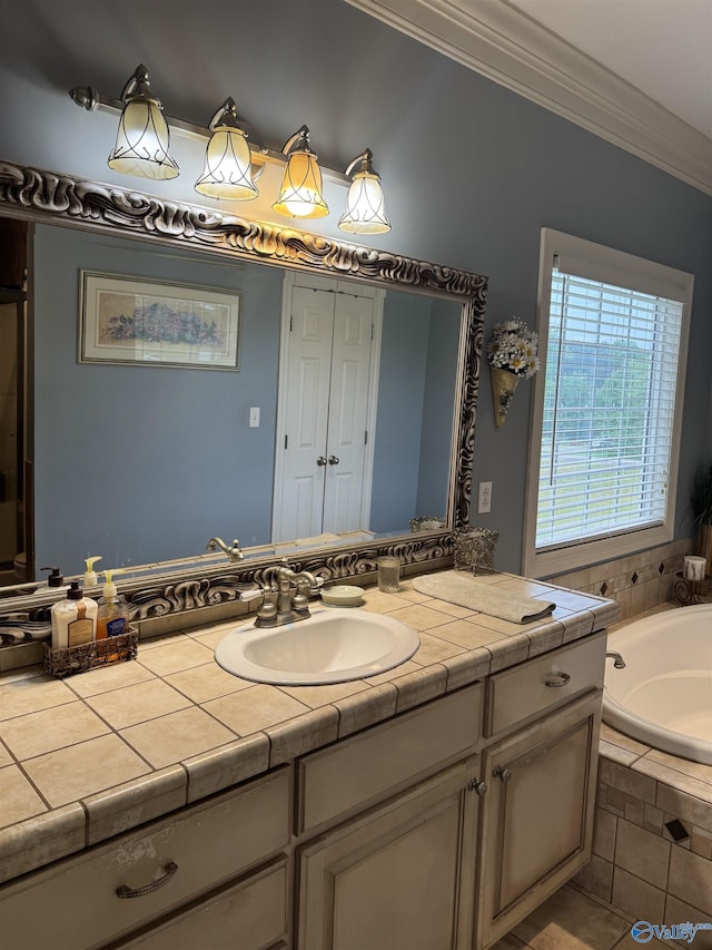 bathroom featuring a bath, vanity, and ornamental molding