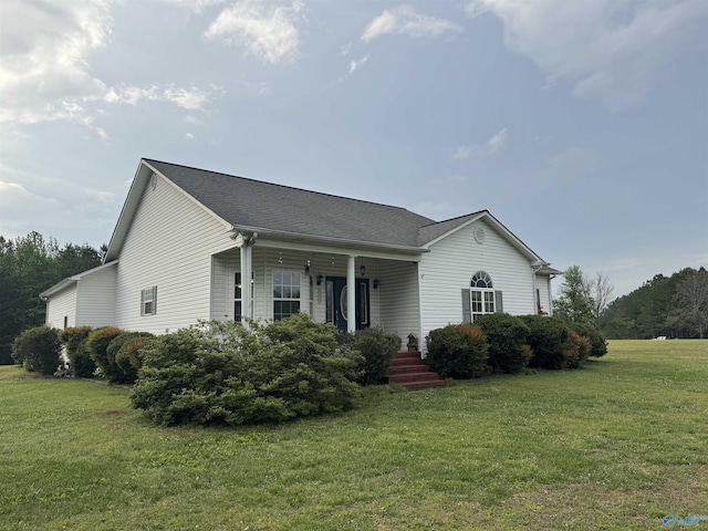 single story home with a front yard, a porch, and roof with shingles