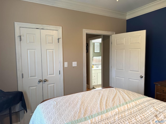 bedroom with a closet and crown molding