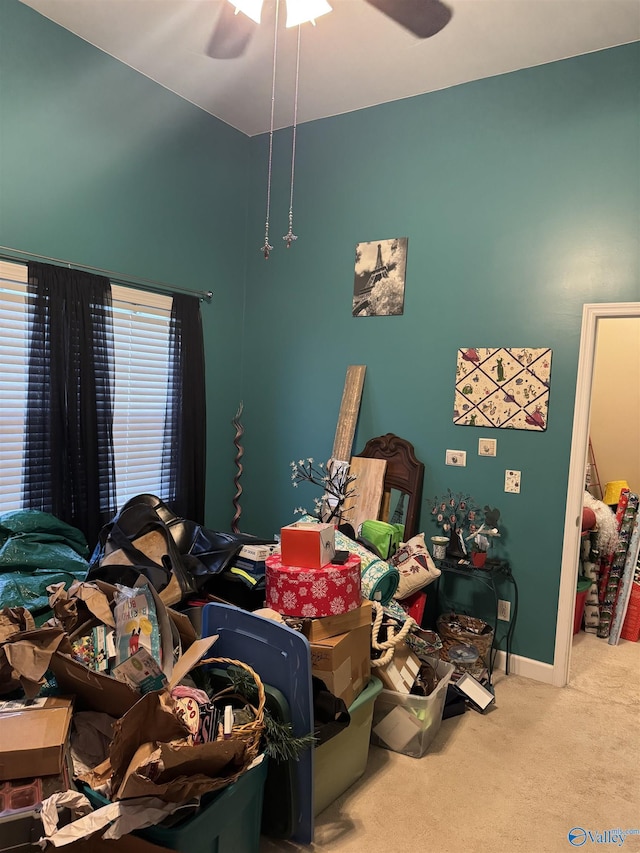 bedroom featuring carpet flooring, baseboards, and ceiling fan