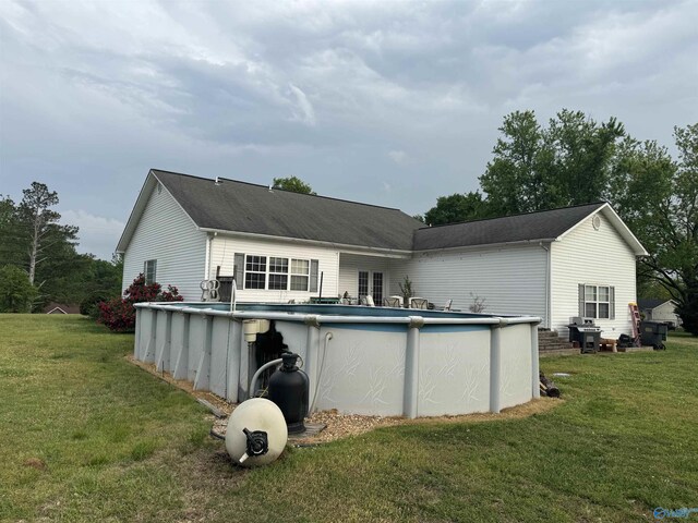 1474 Frost Rd, Eva, AL 35621 - rear view of property with a yard and an outdoor pool