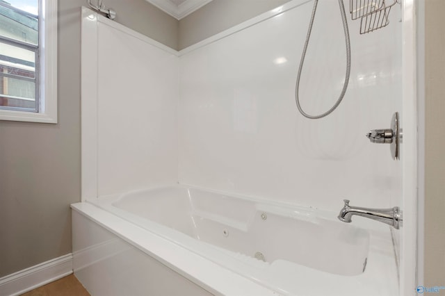 bathroom featuring ornamental molding