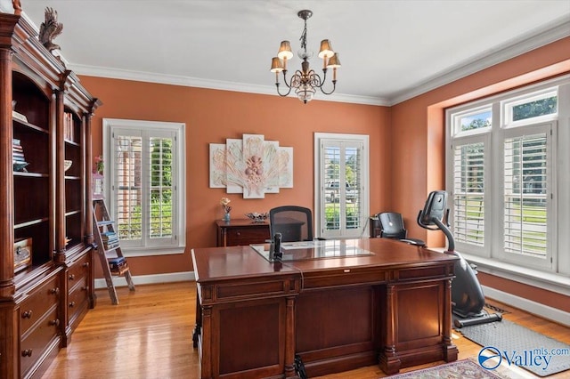office area featuring a chandelier, light wood finished floors, crown molding, and baseboards