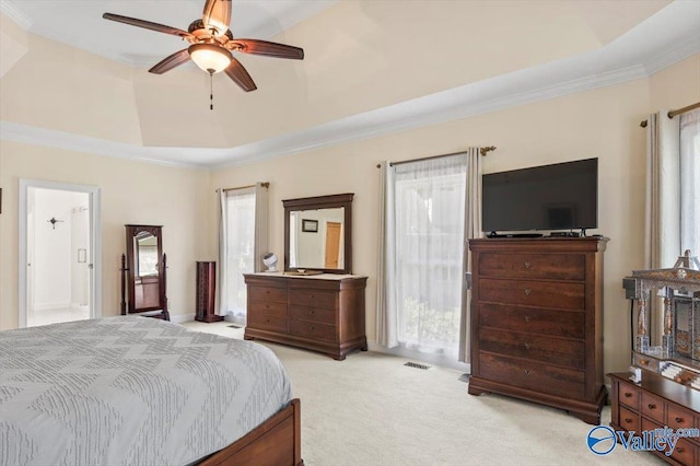 carpeted bedroom with visible vents, vaulted ceiling, ornamental molding, a ceiling fan, and access to outside