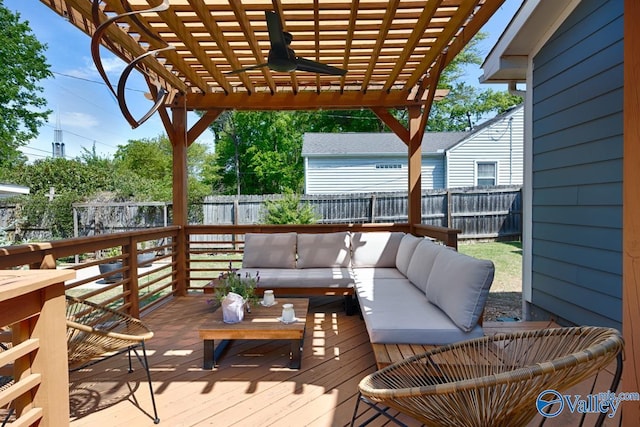 deck with a fenced backyard, outdoor lounge area, ceiling fan, and a pergola