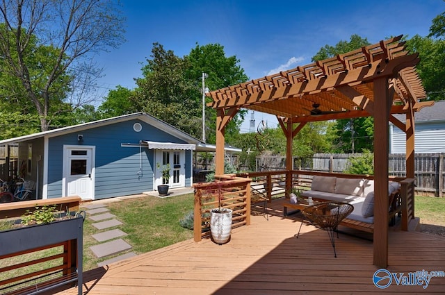 deck with fence, a pergola, an outdoor hangout area, french doors, and a lawn