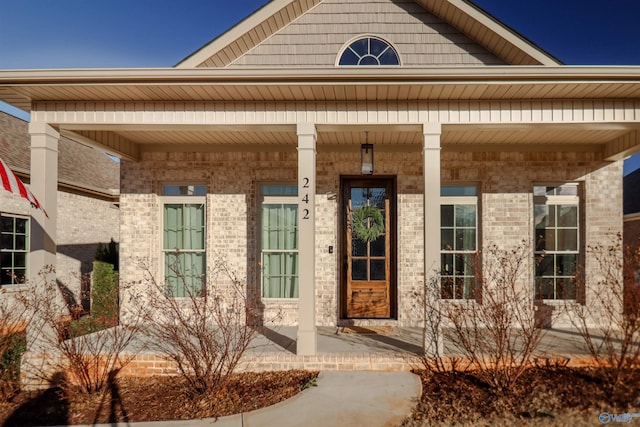 entrance to property with covered porch