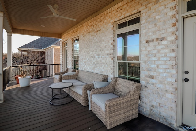 wooden deck with ceiling fan