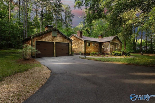 10161 US Highway 11, Springville, AL 35146 - view of front of house with a chimney, a front lawn, and a detached garage