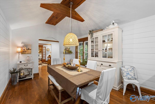 10161 US Highway 11, Springville, AL 35146 - dining space featuring lofted ceiling, dark wood finished floors, baseboards, wood walls, and arched walkways