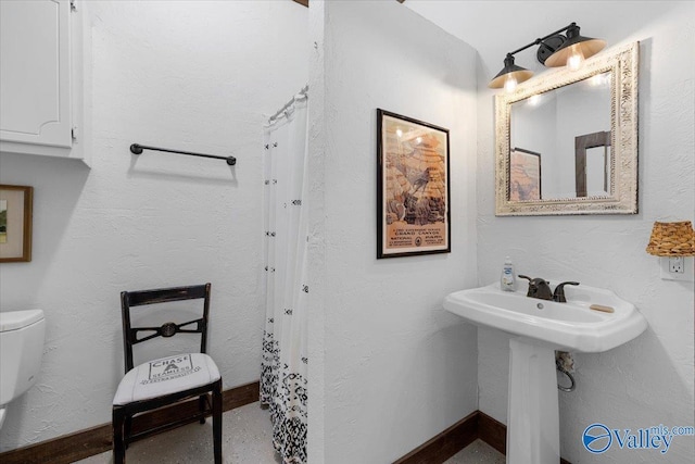 10161 US Highway 11, Springville, AL 35146 - bathroom with toilet and baseboards