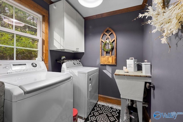 10161 US Highway 11, Springville, AL 35146 - washroom featuring cabinet space, washer and clothes dryer, crown molding, and baseboards