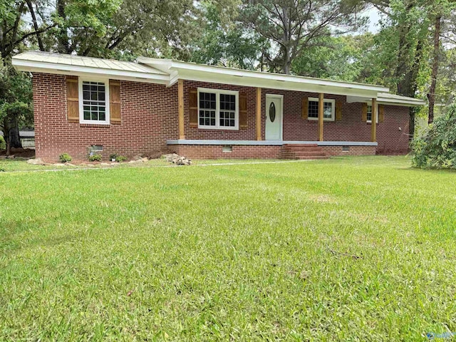 403 SW Arcadia St, Hartselle, AL 35640 - ranch-style home featuring a front lawn, crawl space, and brick siding