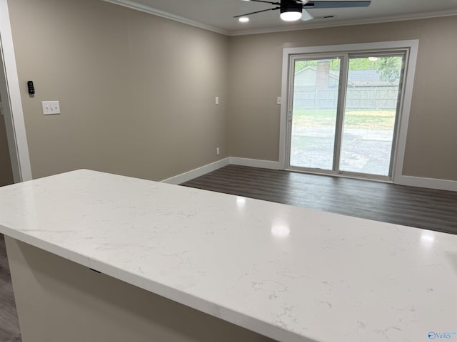 403 SW Arcadia St, Hartselle, AL 35640 - kitchen with crown molding, dark wood-style flooring, baseboards, a ceiling fan, and recessed lighting