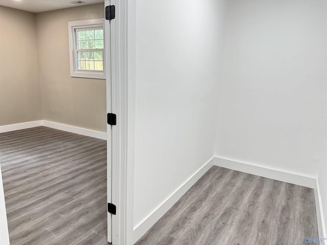 403 SW Arcadia St, Hartselle, AL 35640 - spare room featuring baseboards and wood finished floors