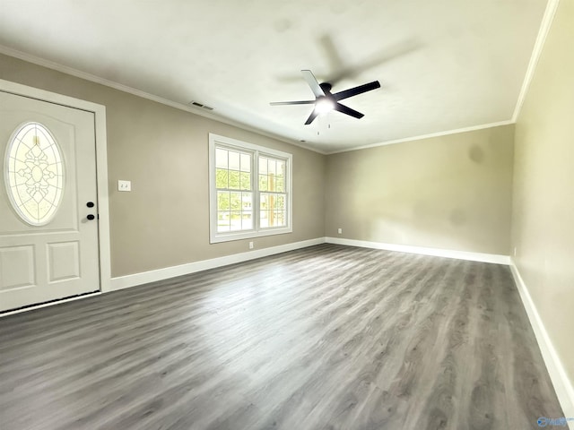 403 SW Arcadia St, Hartselle, AL 35640 - foyer entrance featuring baseboards, a ceiling fan, wood finished floors, and ornamental molding
