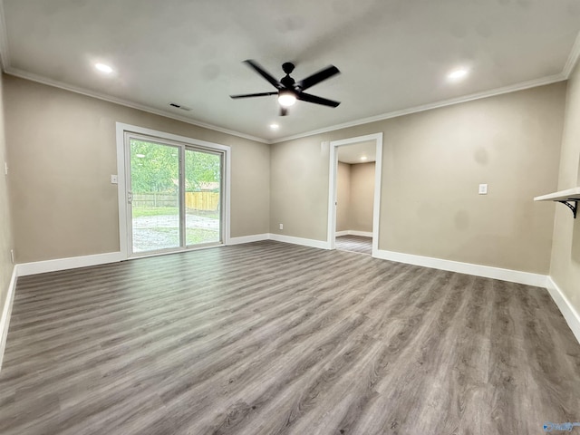403 SW Arcadia St, Hartselle, AL 35640 - unfurnished room featuring wood finished floors, baseboards, ornamental molding, ceiling fan, and recessed lighting
