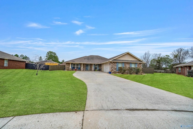 single story home featuring a garage and a front lawn