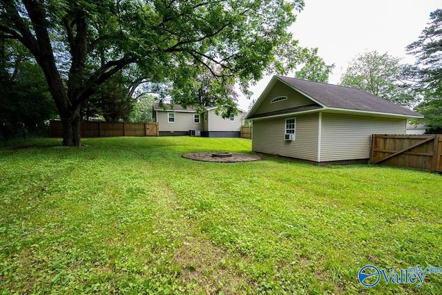 152 6th St W, Grant, AL 35747 - view of yard featuring an outdoor fire pit and central AC