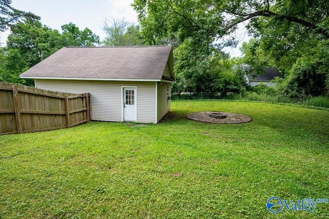 152 6th St W, Grant, AL 35747 - view of yard featuring an outdoor fire pit and an outbuilding
