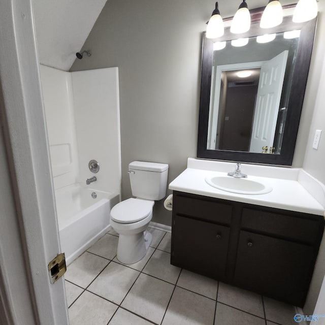 full bathroom featuring tile patterned floors, vanity, toilet, and washtub / shower combination