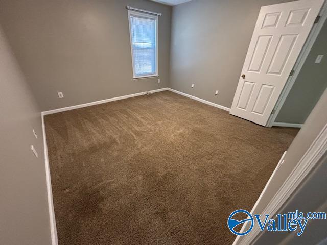 empty room with carpet floors