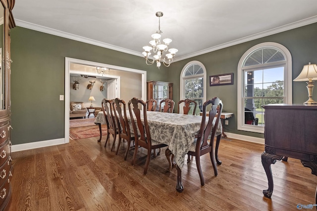 902 County Road 163, Centre, AL 35960 - dining area with a chandelier, wood finished floors, and crown molding