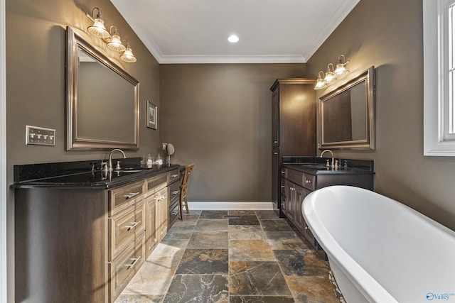 902 County Road 163, Centre, AL 35960 - bathroom featuring a soaking tub, two vanities, stone finish flooring, crown molding, and recessed lighting