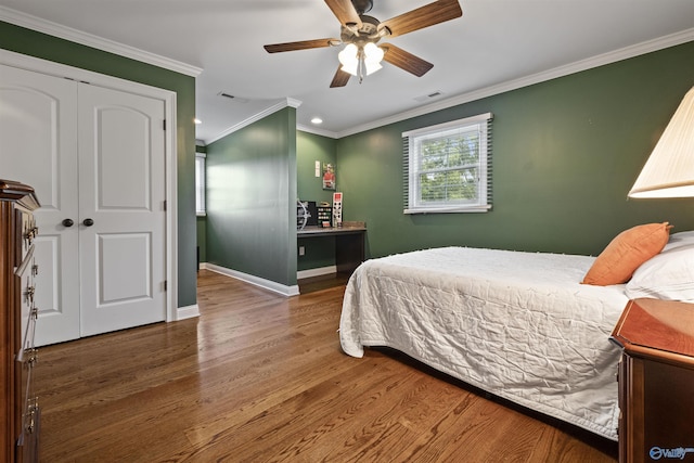 902 County Road 163, Centre, AL 35960 - bedroom with wood finished floors, ornamental molding, recessed lighting, and ceiling fan