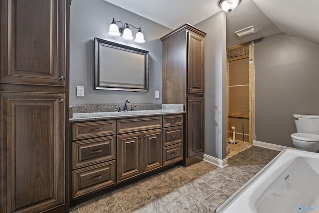 902 County Road 163, Centre, AL 35960 - full bathroom featuring vaulted ceiling, vanity, and a tub
