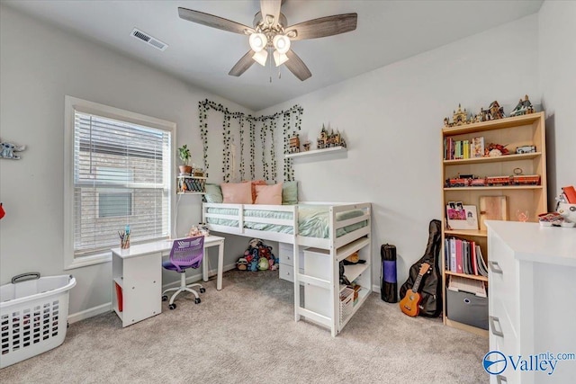 bedroom with light carpet and ceiling fan