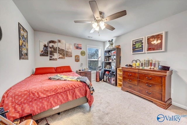 carpeted bedroom featuring ceiling fan