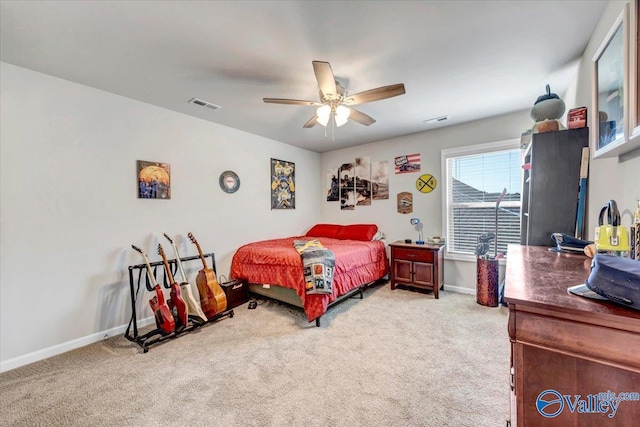 bedroom with ceiling fan and carpet