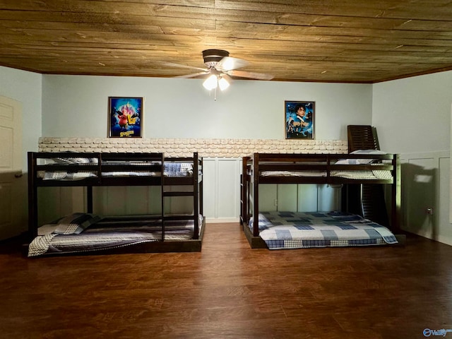 bedroom featuring wood ceiling, ceiling fan, and dark wood-type flooring