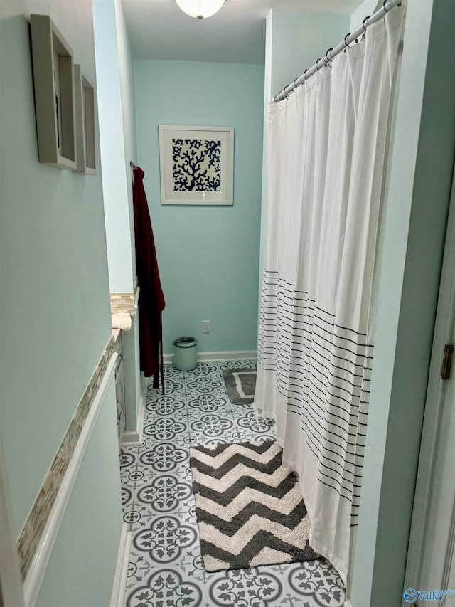 bathroom featuring walk in shower