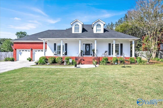 view of front of property with a porch, stucco siding, fence, a front lawn, and an attached garage