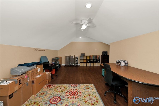 home office with wood finished floors, a ceiling fan, and vaulted ceiling