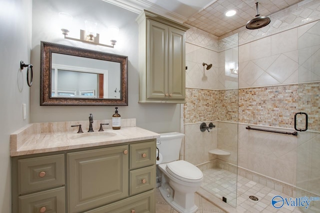 bathroom featuring walk in shower, crown molding, toilet, and vanity