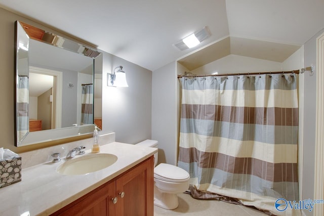 bathroom with vanity, tile patterned floors, and toilet