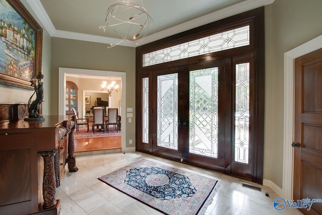 foyer entrance featuring a notable chandelier, light tile patterned flooring, french doors, and ornamental molding