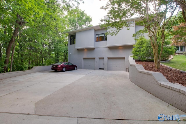 view of home's exterior with a garage