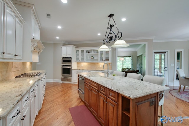 2833 High Mountain Rd NE, Huntsville, AL 35811 - kitchen with a kitchen breakfast bar, open shelves, a sink, a warming drawer, and white cabinetry