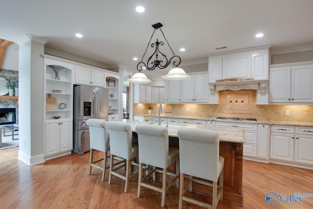 2833 High Mountain Rd NE, Huntsville, AL 35811 - kitchen featuring crown molding, white cabinetry, open shelves, and appliances with stainless steel finishes